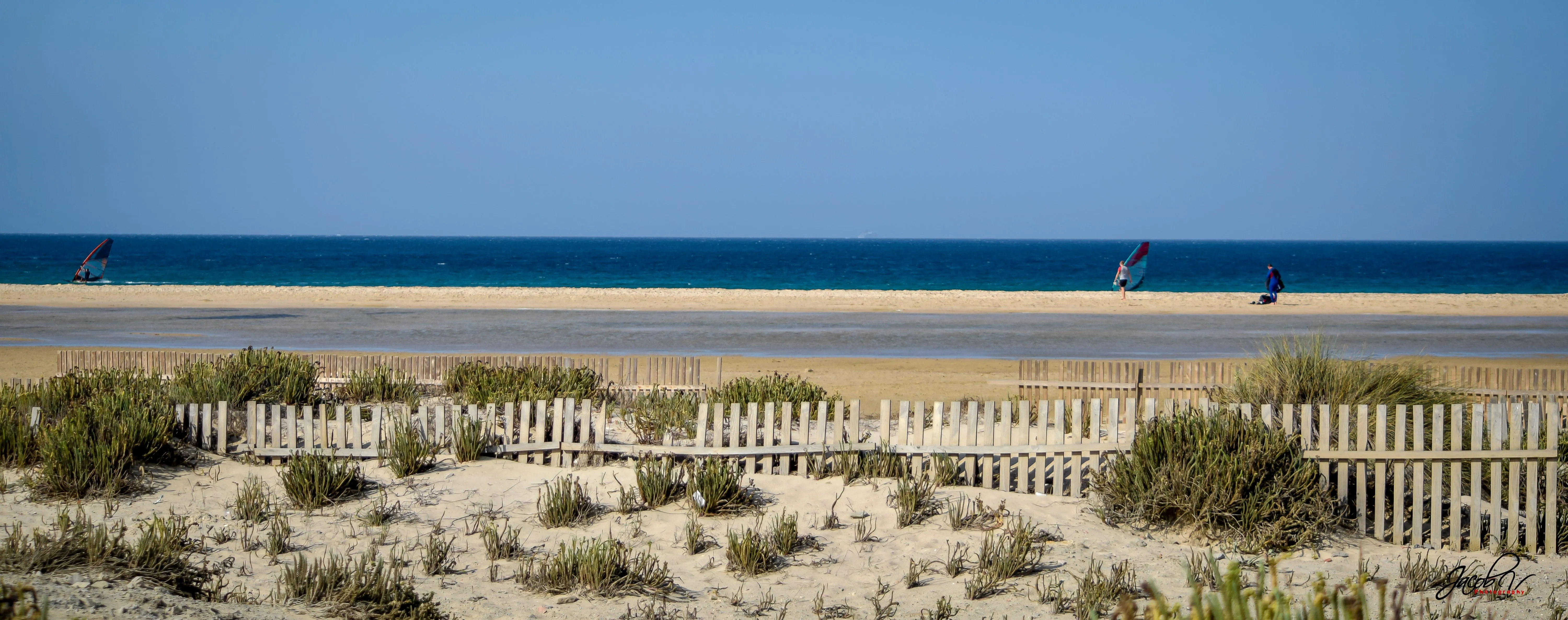 Los Lances beach with windsurfers